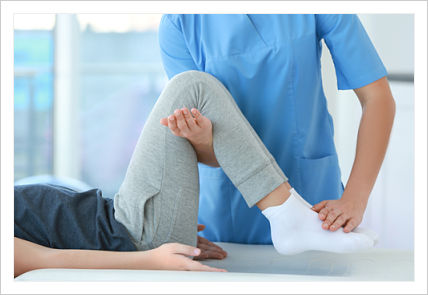 This is a picture of a physical therapist helping a patient